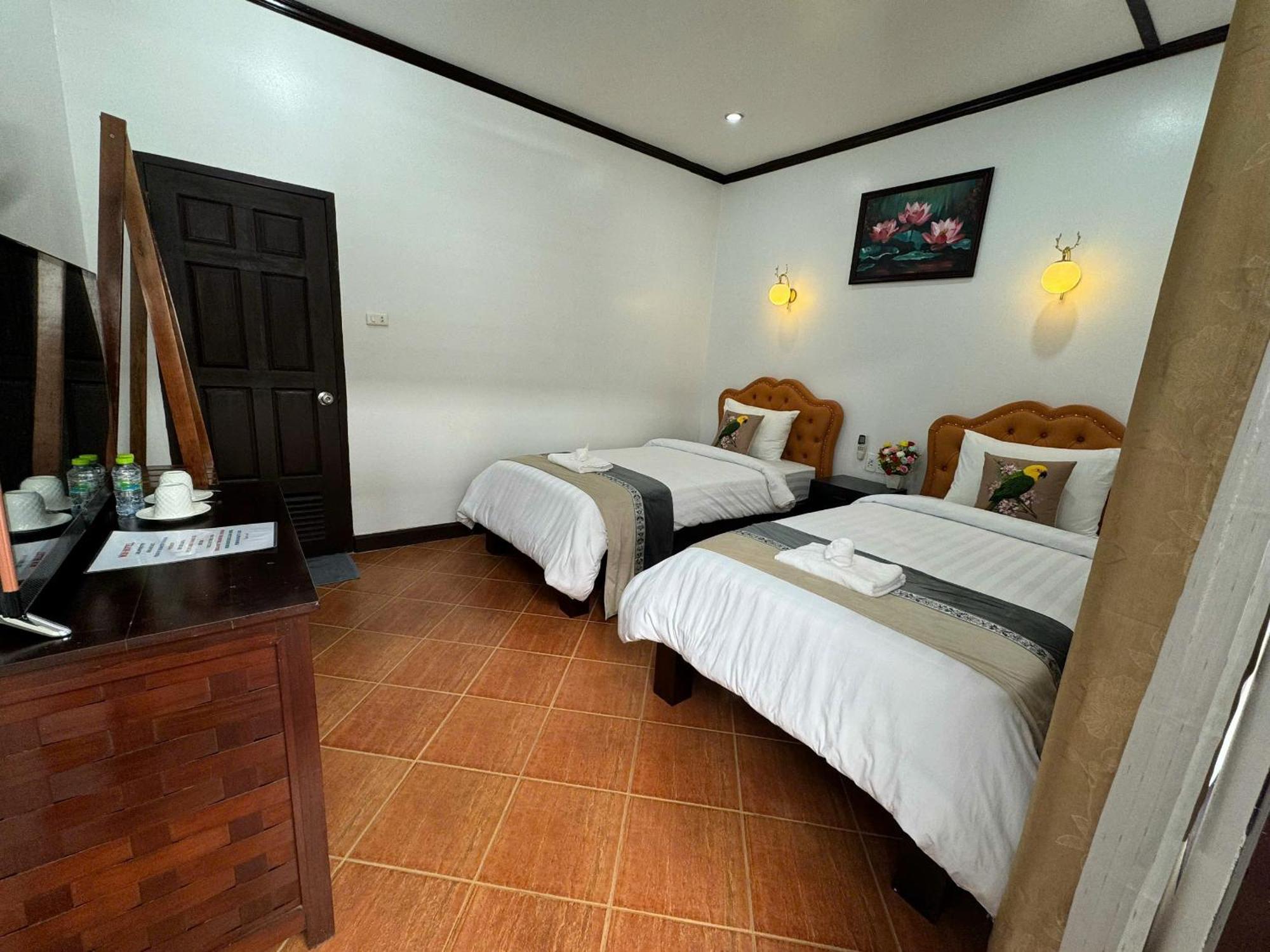 Win Hotel ヴァンヴィエン 部屋 写真